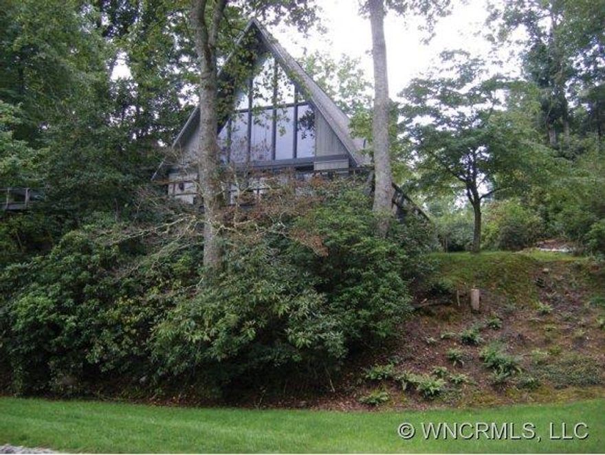 A-frame style,wrap around decks-screen porch,level access and just a few steps to the shoreline-LAKE TICOA-great views-perfect mountain style,rustic, soaring ceilings,huge FP- spacious decks-large unfinished basement-workshop-future rec.room-Plenty of deep water for your future boat dock- main level nicely laid out-guest spaces galore- original Owner-now offering TO PAY the IUA FEE of $8,000. for Buyer at closing!MAKE AN OFFER!