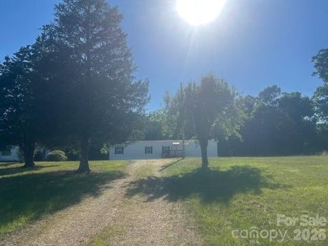 Photo of 547 Indian Hill Road, Olin, NC 28660 (MLS # 4384090)
