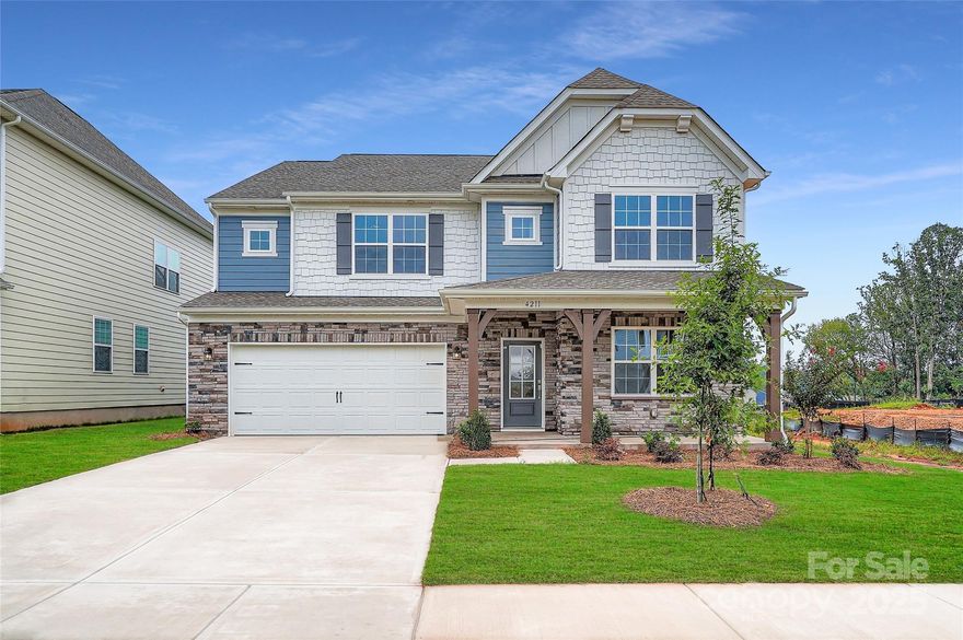 This Grisham is a two-story home that features an airy layout among a first-floor kitchen with a large center island, breakfast nook and family room that’s fit for modern times. The spacious guest suite enjoys privacy on the main floor with a convenient full-sized bathroom. A study replaces a living room. On the second floor is a large loft to provide additional shared living space surrounded by three restful bedrooms and an owner's suite. A two-car garage completes the home. Plus, our signature Everything's Included program means you will get quartz or granite kitchen countertops, subway tile backsplash, ceramic tile, and luxury vinyl plank flooring at no extra cost! Welcome to Elizabeth, a sought-after master-planned community located in the heart of Fort Mill, offering 7 collections of new homes.