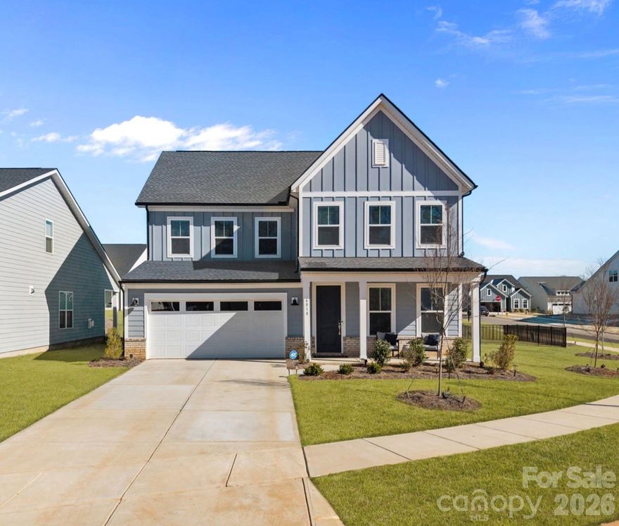 This stunning corner lot, 2024-built modern home offers 4 bedrooms and 3.5 bathrooms in a brand-new Charlotte neighborhood just 15 minutes from Uptown. Clean lines, contemporary finishes, and an open-concept layout create a bright, effortless flow throughout. The chef’s kitchen anchors the main level with sleek cabinetry, quartz countertops, and a large island perfect for entertaining. The primary suite is a true retreat featuring a spa-inspired bath and generous walk-in closet. Secondary bedrooms are spacious and thoughtfully designed. Outside is a large spacious fenced-in backyard, perfect for outdoor living and entertaining. High-end finishes, smart design, and energy-efficient features elevate everyday living.  Enjoy the feel of new construction without the wait in a growing community close to dining, shopping, and major commuter routes. Landscaping included with HOA with resort style amenities coming soon. Modern living, convenient location, and move-in ready—this one checks every box.