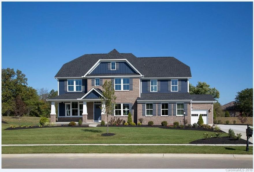 The stately Normandy home combines traditional elegance with all of today's modern amenities. What a kitchen! The huge island is the focal point of this open kitchen space that opens into a massive great room. Upstairs, you'll delight in the large bedrooms, and a master suite with walk in closet and luxury bath. All this and a huge basement with FINISHED REC ROOM!  Community features huge clubhouse and pool with relaxing lazy river.