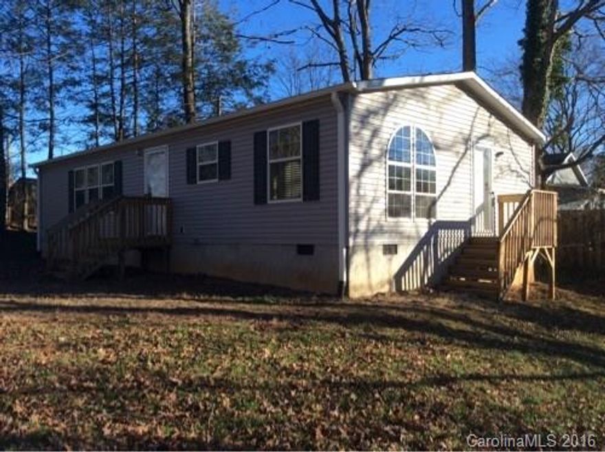 Very Nice 2011 Clayton Manufactured Home Finished Dry Wall Stone Fireplace in Living Room 3 Bedrooms 2 Full Baths His and Hers Vanity Master Bath Kitchen Range Refrigerator Microwave Dishwasher Central Heat and Air Permanent Foundation Energy Efficient Financing for most credit situations.