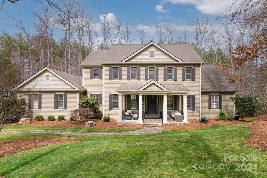 Located in a private cul-de-sac this impressive home offers an inviting retreat for modern living. Its soaring 2-story living room immediately captures your attention as the heart of the home with a striking stone fireplace and natural light from expansive windows. The main level designed for effortless living features the primary owners suite, a spacious office and formal dining room. Its cozy kitchen equipped with stainless steel appliances, tasteful decor and eat-in area is perfect for casual dining. Upstairs, you will find 3 additional spacious bedrooms. The lower level provides multiple entertainment options with a rec room, theater & mini kitchen, exercise rm & extra bedroom. Its private backyard oasis with in-ground pool, hot tub, & lush landscaping, provides a haven for relaxing & outdoor living. On top of all of that, this home is adjacent to the walking trails that lead to the lake & its array of amenities including game courts, community dock, beach area & clubhouse.