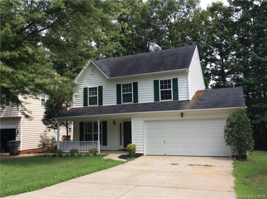 Charming home with rocking chair front porch & wooded backyard! Lots of updates! - New paint throughout (in & out), new carpeting, fixtures/hardware, etc! Bright, eat-in kitchen with gas cooktop/oven & tile flooring open to the family room with cozy fireplace. Breakfast area leads to deck overlooking private, wooded back yard! Large master  with tray ceiling, spacious bath & oversized closet! 2nd bath up features dramatic sky light. 2-car garage, awesome neighborhood close to everything! Hurry!