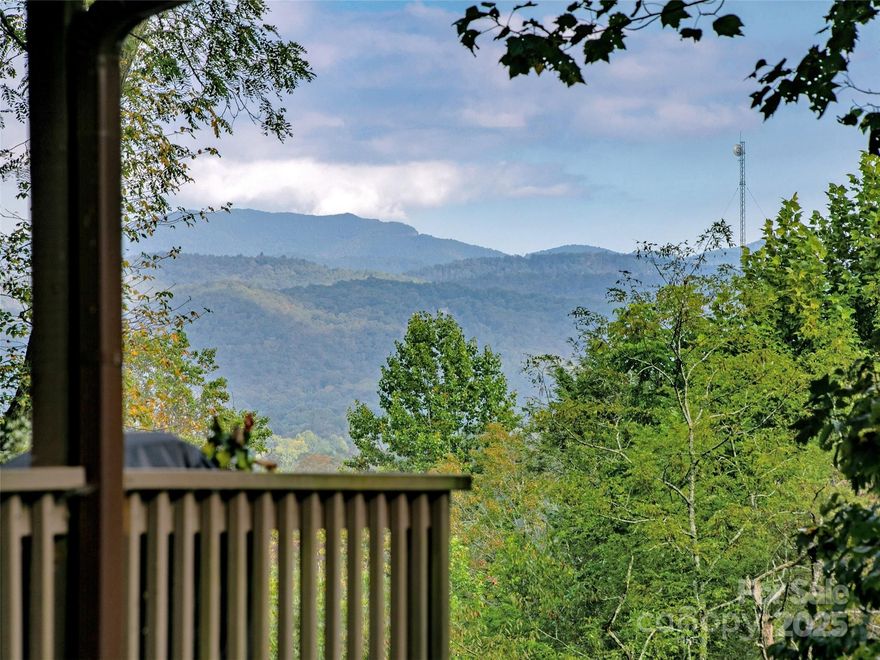 This VIEW in a beautifully renovated home close to town?  You bet!  Move in ready. One level living with an open floor plan. Perfect for entertaining with great flow. Expand out to covered and open deck and porch, or gather in the courtyard and enjoy the low maintenance landscaping.  The kitchen features hickory cabinets and tile floor. Both full baths have been upgraded with quality finishes and fine tile work. The guest bath has a soaker tub and the primary bath features a spacious walk-in shower. One of the bedrooms has an office nook, built in, that can be hidden when guests visit. Stone fireplace with gas logs. (Could be converted back to a wood burning one if desired). Large laundry room with plenty of cabinet storage and counter tops for crafting.  Courtyard could have a small fence for a dog.