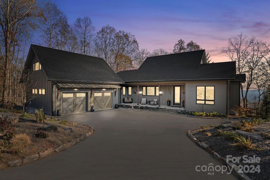 Stunning mountain views! Easy one level living awaits you; this stunning home was thoughtfully designed to pull in the breathtaking mountain views from each room. Spend your evenings taking in the views from the hot tub located on the private deck off the primary suite. Open concept living with expansive ceilings. Mindfully designed home with features such as Cummins Whole House generator, Whole House Clack Water Filtration System, Navien Tankless Hot Water Heater, Stainless Steel Bosch kitchen appliances, custom cabinetry, Siletone and granite countertops throughout. Current Homeowner additions include flex space over garage with separate entrance, ideal for home office or studio, 12x20 deck off primary suite, fully fenced back yard, additional storage in crawl space and more. Located in the iconic community of Couch Mountain featuring 135+acres of Nature Preserve, community gardens, hiking trails and more.