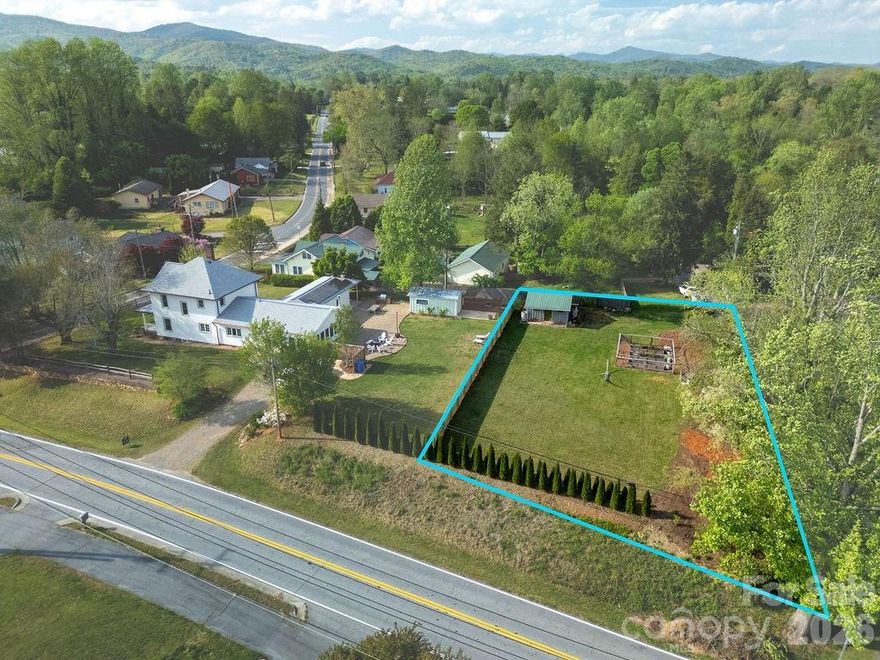 Exceptional opportunity to own a level 0.30-acre lot with clean, private access in one of Brevard’s most desirable in-town locations. Positioned just across the street from the bike path and sidewalk system, this property offers seamless connectivity through some of Brevard’s most sought-after neighborhoods.

Located in downtown Brevard, the property is a short, easy stroll to Main Street where you can enjoy local culture, live music, restaurants, and boutique shopping right at your fingertips.

This larger-than-average in-town lot offers a rare combination of space and privacy. Elevated well above the road, the homesite benefits from a natural buffer that enhances both privacy and sound insulation—an uncommon feature for properties in the heart of downtown. The topography is ideal for building, providing a level foundation with flexible design potential.

In-town living remains one of the most desirable choices for those relocating to Brevard, offering walkability, community connection, and convenient access to everyday needs. Known as the “Land of Waterfalls,” Brevard is uniquely situated like a donut hole—surrounded by protected lands including Pisgah National Forest and DuPont State Recreational Forest—helping preserve its charm and shield it from the urban sprawl seen in larger cities. Outdoor recreation is unmatched, with world-class hiking, mountain biking, fly fishing, and scenic beauty in every direction.

Despite its peaceful setting, the property is conveniently located approximately 30 minutes to Asheville Regional Airport, providing easy access for travel, business, or weekend getaways.

Whether you're looking to build a full-time residence, second home, or investment property, this lot offers the ideal blend of location, usability, and lifestyle. Opportunities like this—combining privacy, proximity, and setting—are increasingly rare in Brevard.

Don’t miss your chance to secure a premium homesite in one of Western North Carolina’s most sought-after mountain towns. Schedule your showing today.