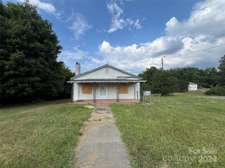 +|- 2.22 acres located on Salome Church Rd (1900 State Rd 2469). This home is being sold as a tear-down and redevelopment opportunity. Value in the land: the home was sold AS-IS. Zoned N1-A.  See agent remarks for Mecklenburg County UDO. Multifamily R-12 MF(CD) across the street.