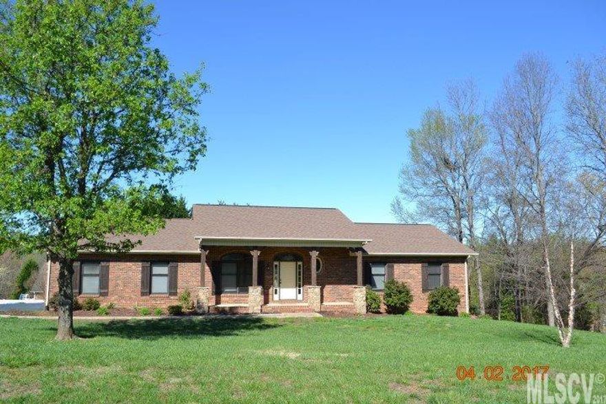 Don't miss your opportunity to live in this amazing neighborhood with beautiful pond and convenient to everything! Full brick ranch with full basement, interior freshly painted,  new stainless dishwasher and range, glistening refinished hardwood floors, beautiful tiled floors with decorative inlays in the baths, man cave in the basement and additional room for whatever you may need! Gas log fireplace in den, brand new heat pump just installed, new garage door openers, 50 year shingle approximately 7 years old, must see inside this beautiful home!