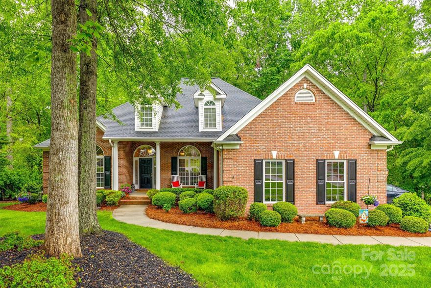 Welcome to this beautifully landscaped full-brick home in a highly desired neighborhood, minutes from Lake Wylie & zoned for top-rated Clover schools. Thoughtfully designed with a split floor plan, this solid-built home offers comfort & flexibility, perfect for those who work from home or looking for multigenerational living options. Step inside to fresh paint & generous living areas. The walkout basement offers a shop with an additional automatic garage door easily accessible from the main driveway & many other possibilities - additional living space, home gym, media room or create your own dream space. Enjoy the serenity of the back deck, overlooking a peaceful wooded backdrop, with the quiet calm of nature. Whether entertaining guests or sipping morning coffee, this setting offers the privacy you crave. With strong bones & timeless curb appeal, this home is move-in ready with equity opportunity for those wanting to add their own personal touches in the partially finished basement.