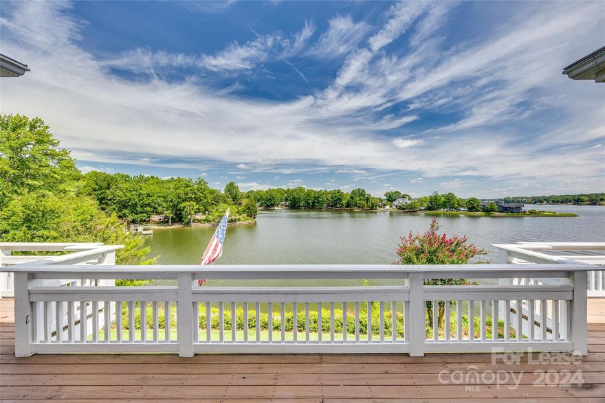 Enjoy breathtaking views at this fabulous waterfront home. It is a resort within a resort. Tucked into almost an acre of privacy in a cove but within view of the main channel, this beautiful home has a wrap-around porch and a sitting area off the boat dock where you can enjoy the outdoors. The kitchen and dining area are fabulous, and the living area also has wonderful views of the lake. The spacious primary suite on the main level has a large closet, a deluxe bath area, and excellent views.  The main level also boasts a separate office and a laundry room. The basement has two bedrooms, two baths, and a large rec room for entertaining.  Oversized two-car garage.
River Hills is a gated community with many amenities, including walking trails, a playground, a dog park, a beach, and a waterfront park. It also has a Marina and a Country Club with an 18-hole championship course. 






It is close to shopping and restaurants and has award-winning schools.