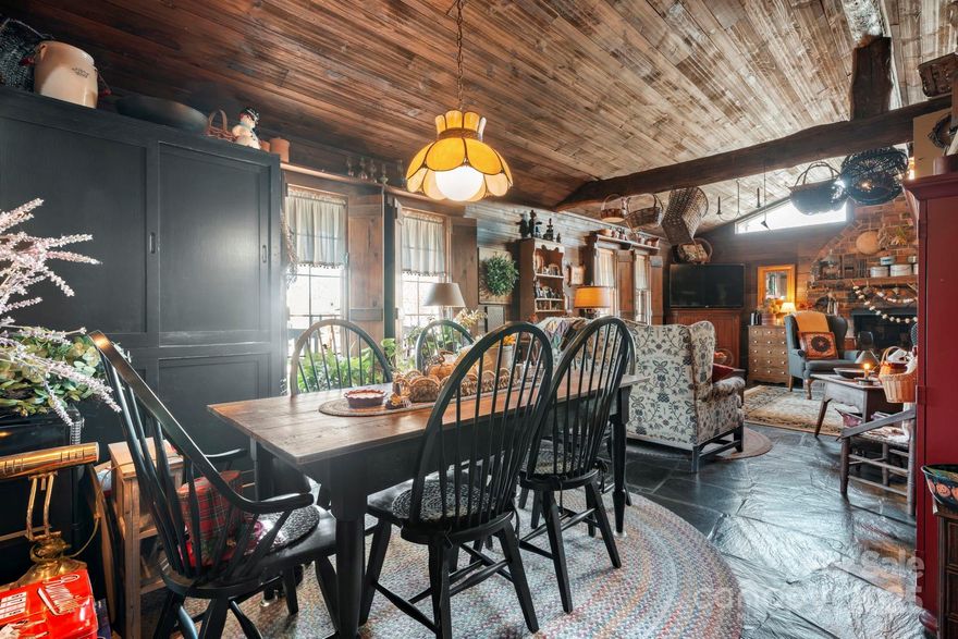 Welcome to this beautiful storybook Arts & Crafts style home, perfectly situated on a charming corner in a town that is growing, thriving, and full of opportunity. This 3-bedroom, 2-bath home is truly one-of-a-kind, offering unique architectural touches and a warm, inviting feel the moment you step inside.
Thoughtful details and handcrafted style flow throughout, creating a cozy atmosphere ideal for everyday living. The home features a flexible space that can serve as den/ living area combo or room to entertain whatever you need it to be.

Outside, you’ll find multiple patio areas designed for privacy, relaxation, and effortless entertaining. Whether you’re hosting friends or enjoying a quiet morning coffee, the outdoor spaces make this home feel like your own private escape.

Just one block from Main Street, you’ll love the convenience of walking to parks, schools, dining, shopping, and local entertainment. With booming job opportunities and a vibrant uptown area nearby, this location offers both comfort and growth.This home is truly unique in style, rich in charm, and nestled in one of the most desirable pockets of town, don’t miss your chance to make it yours.