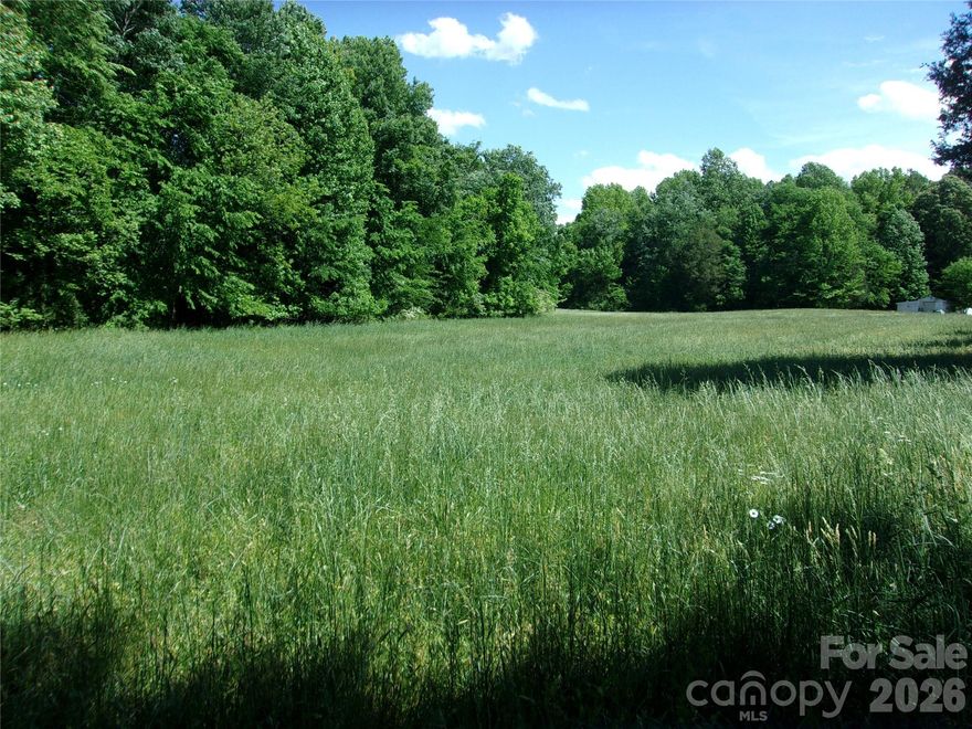 Property consist  of 36.278 ac. +/-,  375 ft +/- on paved road frontage on Longview Rd. has county water will need private setpic system. open land seeded in established fescue currently being farmed /cut for hay by local person,
13,66 ac. +/- in Rowan  County across small stream to the east of the frontage on Longview Rd. land lays nicely to farming  and or development. At present time the seller has requested no sign be placed on the property. Call listing agent at 704-929-0704 for showing. Will be recorded in buyers deed that 3-5 ac. parcels may be survered out with a site built 2000 sq. home to be built.
