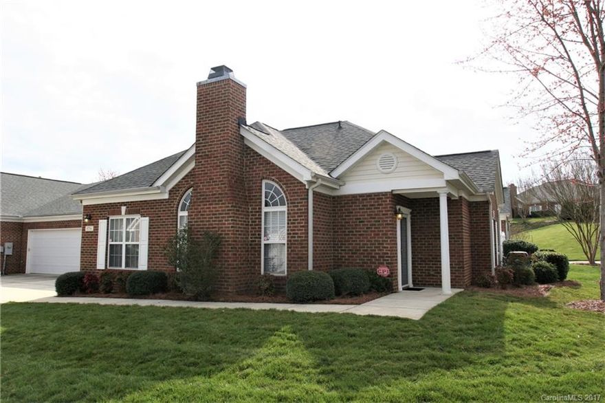 Beautiful full brick condo with two car garage. Immaculate and well cared for. Granite kitchen, s/s appliances, neutral paint throughout, upgraded light fixtures and updated baths. Come enjoy the maintenance free living this home offers. Air conditioner has a 5 year warranty. HOA includes Water/Sewer. Great curb appeal. (Private Roads) JULY POSSESSION (can close before July)