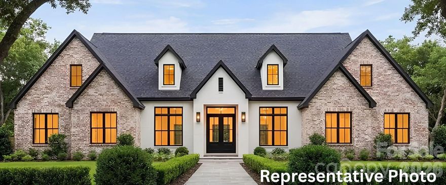 Introducing an exceptional opportunity to build your dream custom home with Providence Custom Builders (PCB), the exclusive builder of this intimate 4-lot enclave. Positioned on Lot #1, this 5.89+/- acre wooded homesite offers unparalleled privacy and a serene natural backdrop, an ideal setting for refined living. This is thoughtfully designed for elevated single-level living. This exceptional residence blends timeless architecture with modern luxury and intentional functionality throughout. A striking front elevation showcases refined symmetry and architectural presence, setting the tone for the sophisticated design within. The flexible floor plan offers five bedrooms on the main level, complemented by a fully finished bonus room on the second level, or 6th bedroom, completed with a private full bath, ideal for guests, media, or extended living. With 5.5 beautifully appointed bathrooms, every space has been designed with comfort and refinement in mind. The left wing features three bedrooms, along with a game room that has french door access to the rear porch, seamlessly blending indoor and outdoor living. The serene primary suite is privately positioned within the rear right wing of the home, offering a vaulted ceiling, spa-inspired bath retreat, and direct access from the expansive walk-in closet to the laundry room for unmatched convenience. At the heart of the home, the inviting great room features a gas fireplace with custom built-in shelving, creating a warm yet refined gathering space. There is a dedicated home office that provides an ideal environment for productivity or study. The gourmet chef’s kitchen is designed for both performance and elegance, showcasing an oversized island, shaker-style soft-close cabinetry, and abundant workspace. A well-appointed butler’s pantry, completed with a pass-through window to the garage, offers effortless functionality for unloading groceries and daily convenience. Enjoy the rare combination of no HOA with thoughtfully implemented Covenants, Conditions & Restrictions that preserve the integrity and long-term value of this exclusive community. A rare opportunity to build a custom home and create a bespoke residence in a private, boutique setting. 
The offering price includes the complete package, land, perk tests, and the custom home build, providing a seamless, luxury building experience from start to finish. All photos are representative. Home is to be built.
Buyers may build this featured plan or bring a custom design tailored to their vision. The lot must be purchased prior to construction, or incorporated into a construction perm loan. A lot reservation and 10% deposit are required. Pricing is subject to change based on selected finishes, upgrades, and plan modifications. Contact the listing agent for details and to begin your custom build journey.