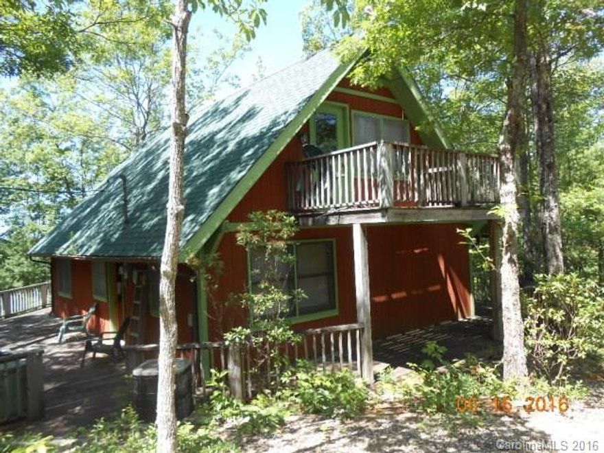 PRICE REDUCED!!! Own your own private cabin in Blue Ridge Mountain heaven!Located in a gated subdivision, this home boasts 3 levels of living, 1 bed/bath per level *(Septic is permitted for 2 bedrooms, however a THIRD BEDROOM has been added in the finished basement). Enjoy cold mountain nights in the great room, next to the wood-burning fireplace.  Over 4 private acres.  New roof in 2015 and recently rebuilt chimney.  This is a must see!!!!!