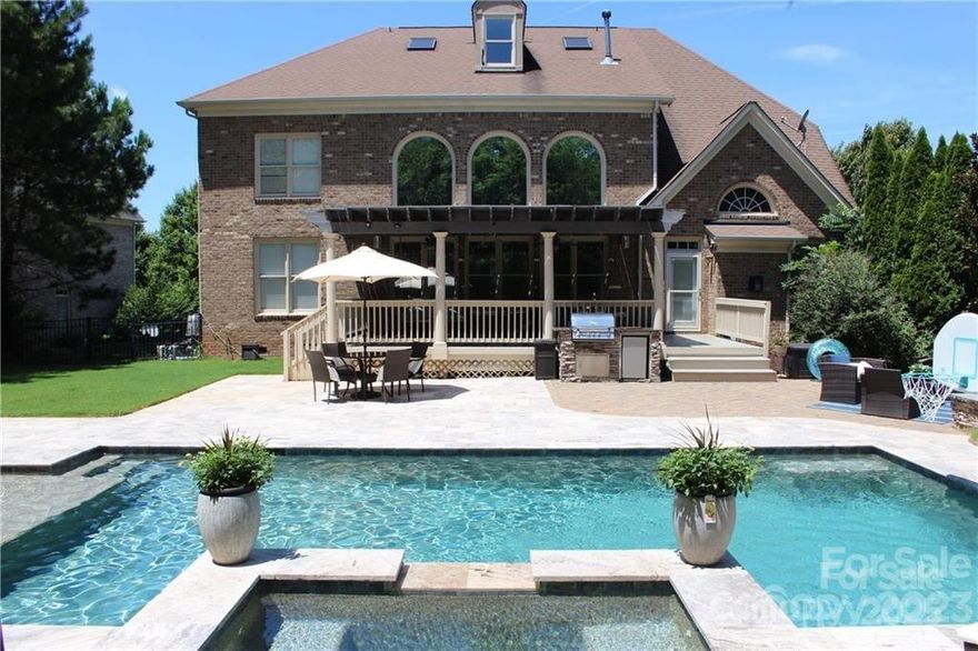 Incredibly updated, top to bottom with designer touches and upgrades around every corner! Phenomenal pool, desirable location and neighborhood! Over 4700 Sq Ft of luxury!