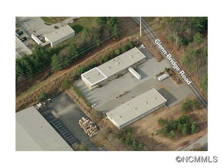Premium end unit. Office/flex space in desirable warehouse/office complex. Warehouse area has an easy-access loading dock at the front of the building. Ample employee and customer parking. Currently used as a church; this space is ideal for church use or as an office/warehouse. Close to Hendersonville Road, Airport Road and Asheville Regional Airport. This unit can be combined with Unit C for a total of 5,300 square feet.