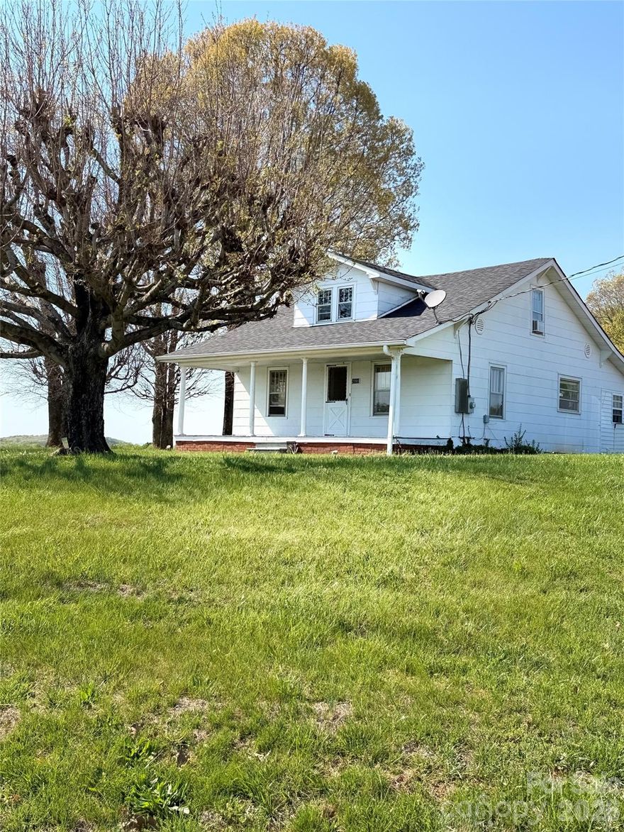 Charming 3 bedroom, 1 bath farmhouse. Multiple barns and buildings on the property with plenty of storage. The house sits on a 13.874 partial and has an additional partial of 2.78 acres, giving you 16.654 acres. The views are definitely something you need to see for yourself. Country living at its finest. Schedule your showing today.