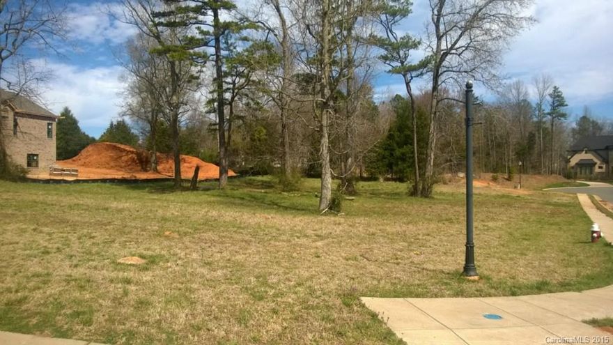 Beautiful corner lot in cul-de-sac. Bring your own builder or we can help you find one. Build your dream home in this established neighborhood. No sign on lot yet, being made.