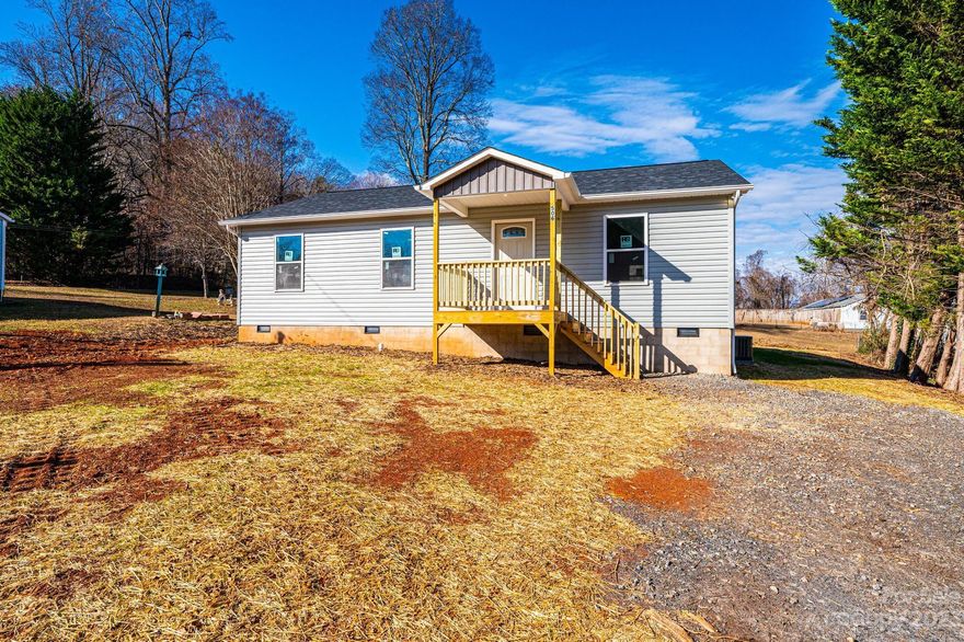 NEW CONSTRUCTION!!!  Located in Lenoir, NC, this 3BR/2BA is oh soooo nice!!!  Wonderful open floor plan with hardwood floors in the main living areas!   You'll love the spacious kitchen with beautiful cabinetry and granite countertops!  All kitchen appliances are included!  The dining area has a sliding glass door to the back deck. 
It's a great spot for entertaining and grilling out!  Conveniently located laundry!  The owner's suite is located on the back of the house.  The guest bedrooms are a nice size.  Stylish bathrooms with tile flooring, pretty vanities and countertops!  Located close to Hwy 321 in an established neighborhood with little traffic.  Easy commute to Hickory, Morganton or the mountains!!!  A must see!!!