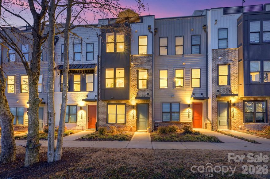 Welcome to 5026 Tiny Lane - a MOVE-IN READY townhome where modern sophistication meets comfortable living. Situated in the heart of popular South End, this 2023 Toll Brothers home offers a luxury urban lifestyle - showcasing an open-concept floorplan with large windows, gorgeous natural light, and neutral colors throughout. The kitchen/dining area features elevated cabinetry, an expansive center island/breakfast bar, and modern stainless steel appliances - a space with both elegance and functionality. The upper level features a generous primary suite with walk-in closet and refined en-suite bath, convenient to laundry and second bedroom with additional full bath. The home's hidden gem is the versatile third level featuring a full bed/bath and bonus room/potential office space that opens to a rooftop terrace with expansive panoramic city views. Excellent storage throughout, including a tandem, attached 2-car garage with extra space for luggage, equipment, etc. HOA dues cover water, trash, exterior maintenance, access to dog park, and termite bond - a significant value! Conveniently located with easy access to Uptown, near the Queen City's best restaurants, sports venues, and top cultural destinations. Refined style truly shines in every detail of this special home!