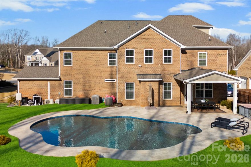 Stunning Executive Home in Sought-After Weddington | Top-Rated Schools
Welcome to this exceptional executive residence in the heart of Weddington, where luxury, comfort, and location come together seamlessly. Situated on a large, private lot backing to wooded views, this home offers refined living both indoors and out—perfect for everyday living and memorable entertaining.
The main level showcases a spacious open-concept kitchen and great room, highlighted by stainless steel appliances, an oversized island, and a butler’s pantry that connects beautifully to the formal spaces. A first-floor guest suite provides ideal accommodations for visitors or multigenerational living.
Upstairs, the primary suite is a true retreat, complemented by three generously sized secondary bedrooms, a loft, and a versatile bonus/flex space—perfect for a home office, media room, or play area. The third floor features a large bonus room, offering endless possibilities for recreation or relaxation.
Outdoor living is elevated with a resort-style in-ground pool surrounded by travertine decking, creating a private backyard oasis ideal for summer gatherings or quiet evenings at home. Hard-wired internet in dining room, office, great room, second floor bonus room and single car garage.  The single car garage also has a mini-split so could be used as a gym or shop.  Home is also wired for outdoor cameras.
Additional highlights include a 4-car garage, abundant storage, and thoughtful design throughout. Conveniently located near top-rated Weddington schools, premier shopping, dining, and everyday amenities, this home truly has it all.  A rare opportunity to enjoy luxury living in one of Union County’s most desirable communities.