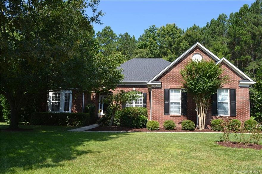 A true gem of a home. All brick ranch with split bedroom plan will not last long! Beautiful outdoor living space with deck and hot tub overlooking the wooded back yard. Beautiful open floor plan includes spacious dining room, great room with fireplace/gas logs. Granite kitchen and sun room overlooking the back yard. Huge master bedroom, master bath with his/her vanities. Office has its on door leading to deck. Full irrigation, tons of attic storage. Newer HVAC and roof, hot tub only a year old.