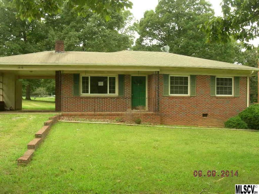 Nice little brick ranch convenient to Hickory or Lenoir. Home has single carport, very large back yard and good curb appeal. Home has had some updates over the years with replacement windows and updated bathroom. Living room has hardwood floors and fireplace. This home is perfect for a retiree or small family. Seller paid closing costs with an acceptable offer. This is a bank owned property.