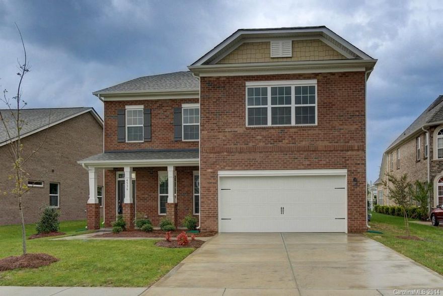 Be the first to live in this lovely large all brick new home! Everything you would expect in a 5 bedroom 3 full bath home and then some. Check out the warm wood floors, the extra trimmings around the transom windows and edges. Fabulous eat in kitchen with dark cabinets and warm toned counter tops. The Master suite is truly a relaxing treat with the large soaker tub and separate tiled shower.