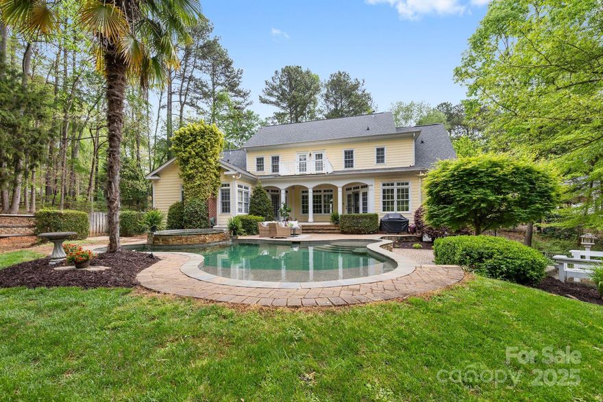 Waterfront, Custom Kingswood Home with Pool/Spa, located on .70, spacious acre lot in one of Denver's most sought after neighborhoods! Located in a protected cove, there are beautiful Main Channel Views from private dock/sitting area & Built in fire pit area with so much room & space to entertain! Oversized, 2 Car Garage! Hardwood floors on main (just refinished)! Freshly Painted throughout! Kitchen with corian counters, tile back splash, gas cook top, double ovens, recessed lights & large walk in pantry, enjoys great pool/lake views! Great Room features gas fireplace & wall of windows facing the lake & pool! Formal Dining Room with crown molding & coveted wainscoting! Office on main! Primary Suite on main level with sitting area featuring an additional gas fireplace, offers views of lake/pool as well! Guest Suite with Bath on upper level! All Bedrooms have walk in closets! Huge Bonus Room! Extra Flex Space/Study on upper level with built in desk area! Walk in Attic Storage is a Plus!