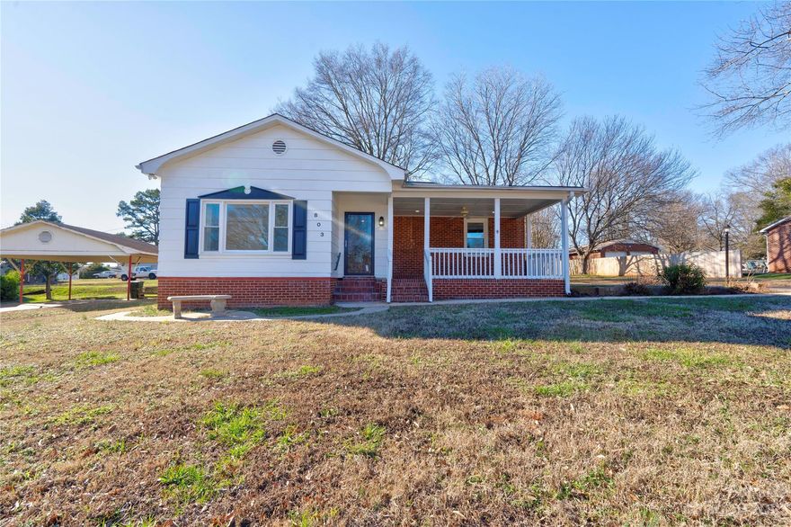 Cute renovated 2 br 1 bath bungalow home on approx .461 acre in City of Kings Mountain. Home is built with an open floor plan & is freshly painted. It has new carpet, flooring, kitchen, bath, lighting & electric box. Living Room gets plenty of natural light. There are vinyl replacement windows. Family Room has a brick fireplace. Dining Room has built-ins. Kitchen is spacious. Laundry Room is spacious. Bedroom 1 has 2 closets. Bedroom 2 has 2 built-in corner shelves. There is a large covered rocking chair front porch - a great place for rocking & relaxing. There is a large brick rear patio with a fire pit. The backyard is large. This home is a MUST SEE!!! Being sold cash or conventional only.