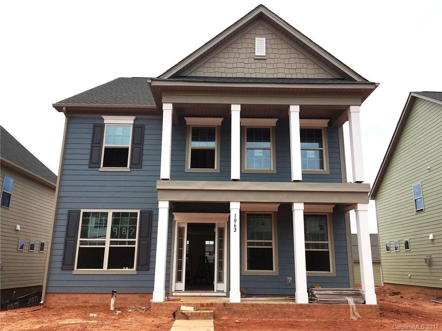 Charming home with double front porch!  The Heirloom has an amazing gourmet kitchen with oversized island, gas cooktop, double wall ovens, large pantry, staggered cabinets, back splash, hardwoods.  Enjoy sitting on the large patio just off your breakfast area.  Upstairs is your owners retreat, which includes a large bedroom with sitting room, large closet, luxury bath.  Energy Star 3.0 certified.  Enjoy the resort style, award winning amenities, including an activity director, MillBridge offers!