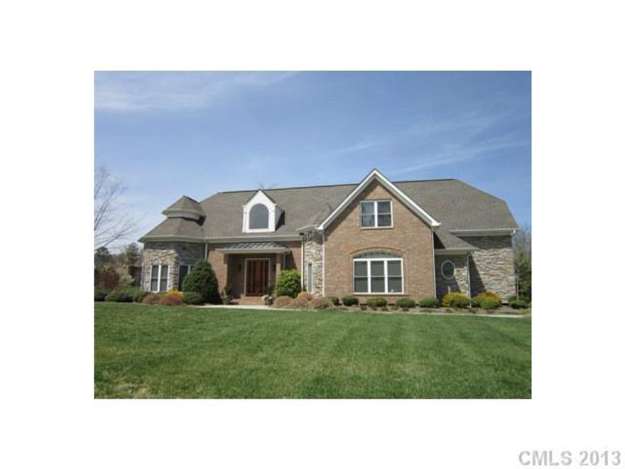 Custom built 1 owner home on beautiful street in Estate Section of Laurel Creek. Includes open floor plan w/ MBR & BR#2 or office on 1st floor and 2 spacious br's  & sitting area upstairs. Beautiful moldings, also includes arched doorways & lots of windows. .Private lot, screened porch & huge garage. Like new construction. Also swim & racquet club plus walking trails. Great location!