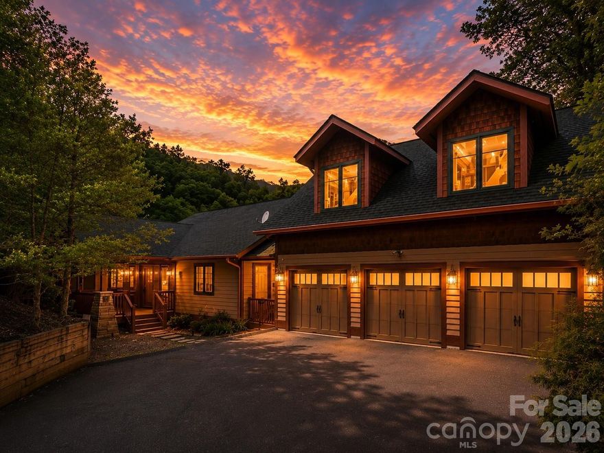 Perched inside the gated mountain community of Laurel Ridge just outside Black Mountain, this fully furnished retreat captures the mountain lifestyle buyers come here searching for. Wake up to long-range views from the deck, spend evenings in the hot tub beneath cool Carolina skies, and gather around the fireplace after days exploring nearby trails, breweries, and downtown Black Mountain.
Designed for both connection and comfort, the home features open living spaces, expansive decking, and warm mountain-inspired finishes throughout. A separate apartment offers added flexibility for guests, multigenerational living, or rental potential, while the theater and game room create the perfect setting for unforgettable weekends and repeat stays.
Whether envisioned as a private escape, income-producing property, or both, this home offers the rare combination of views, privacy, entertainment space, and flexibility in one of the area’s sought-after gated communities.