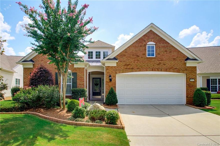 Exquisite Vernon Hill w/ brick front elevation & a beautifully landscaped lot, truly a must see! Upgrades include a custom master closet, heated towel racks, custom moldings, plantation shutters, & insulated garage w/ epoxy floors. Kitchen upgrades include custom drawer roll-outs, custom back-splash, & more! Enjoy an entertainer’s dream backyard equipped w/ paver patio, outdoor kitchen, pergola, sitting wall, & built-in fire pit with wooded & lake views. 55+ Community