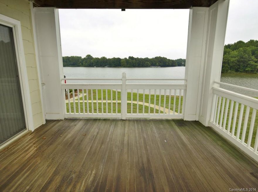 Fabulous WATERFRONT property right on the Lake! End unit with lots of windows and a great open floor plan for enjoying the water view. Great covered deck opens to great room & master bedroom. Master has large walk-in closet & garden tub. Less than 2 miles to town of Davidson. Shopping, restaurants and day to day necessities within 5 miles. Elevators accessible for second floor unit.