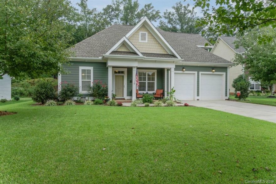 BEAUTIFUL Cul-de-Sac former Model Home with Front Porch, Large Stamped Concrete Patio & Private Fenced Back Yard!  Vaulted Great Room with fireplace flows to Dining & Breakfast area. Classy Kitchen with granite, tile backsplash & breakfast bar. Elegant private Master Suite on main level.  Upper level Guest Suite with full bath. Large Laundry Room. Outdoor garden boxes, blooming perennials, & lush Zoysia grass. Perfect location for both Charlotte & RH access. Walking Trail to Harris Street Park!