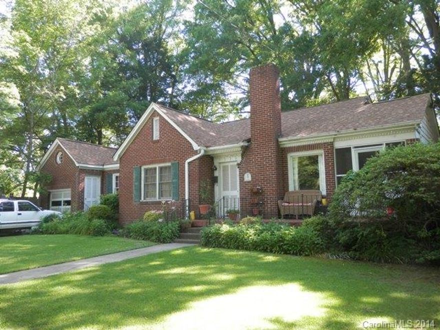 All brick home with hardwoods throughout.  Two full baths.  This home offers all the charm and character of an old home.  Renovated kitchen, however; no kitchen appliances will convey.  Lovely maintained yard, screen porch.