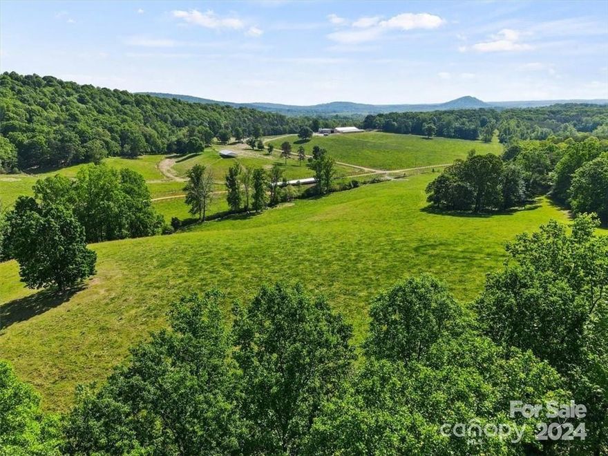 Don’t miss the opportunity to own over 171 acres of pristine land in Wilkes County, North Carolina! This versatile property is perfect for a variety of uses.  Begin your journey on a thriving cattle farm that includes a barn, sheds, and a workshop. The land boasts open pastures with cross fencing, wooded areas, and a serene creek with natural springs, all thoughtfully fenced for maximum functionality. With over 20 strategically placed water drinkers throughout the acreage, livestock care is made easy. For horse enthusiasts, this property is an ideal setting for a private horse farm or equestrian center, featuring well-maintained pastures and ample space for both horses and riders to flourish.  

This remarkable property truly has it all!