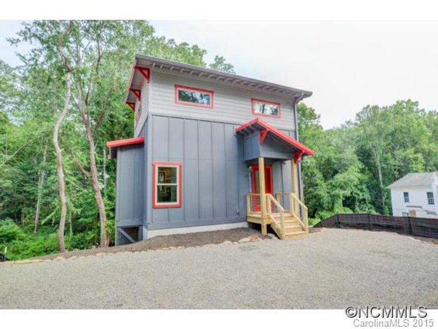 Under construction Greenbuilt home in W.AVL with numerous windows & natural light. Home will be complete June 2015.  Kitchen has granite counter tops, eat-in kitchen bar & gas stove. Master BDR features walk-in-closet, private deck & bath with  & walk in shower.Lower level has family room, BDR. Full unfinished basement perfect for storage. Home located on a lot only .5 mile from Haywood Rd. Taxes TBD