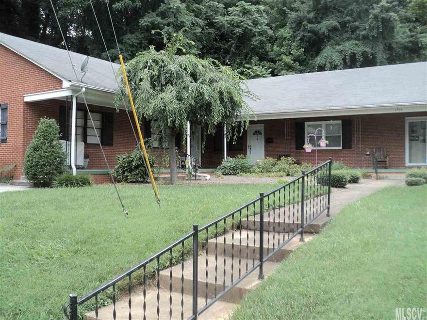 MOVE-IN READY! One level maintenance free living in convenient location. Very nice 2 bedroom, 1 bath unit features a spacious kitchen, large living room, dining area, hardwood & tile floors, laundry room on main & private parking. Large front porch overlooks the well manicured lawn.