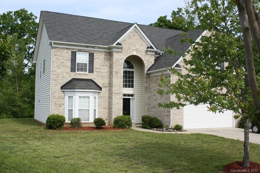 Prepare to be impressed, cul-de-sac location with woods behind. Stately Brick front w/covered porch. 
2 sty foyer, extensive hardwood flooring & open floor plan created for entertaining. Formal DR. Center island kitchen w/plenty of cabinetry & granite counter tops opening to breakfast area & 2 story Great room w/gas log fpl, Main level guest suite. Relaxing bay windowed Master suite w/dual sink vanity, separate shower & tub, huge closet. Come & see why so many call Rocky River Crossing home!