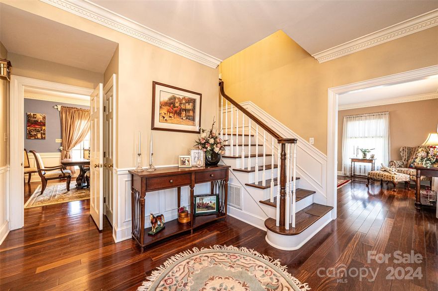 Just reduced to bottom price. Being sold as is. A home as charming as this does not become available often. As soon as you walk into this home you are greeted with the beautiful stair case. Walk into the spacious living room that has lots of natural light, a fireplace and dentil crown molding. The dining room has dentil crown molding, chair railing, French doors and a chandelier that is sure to impress. From there we enter the recently updated kitchen with its dark wood cabinets and granite counter tops, a Wolf gas range and a breakfast area with French doors. Also on this main level you will find a half bath, den and laundry area. Up stairs you will find a total of 4 bedrooms and 2 full baths, 2 large bedrooms that have hardwood flooring and ample closet space, a smaller bedroom that has carpet and would make a great nursery or office area. The Master has tons of room and a private fireplace all to its own. Ask to see estimate for crawlspace work that is needed. HOA is in question