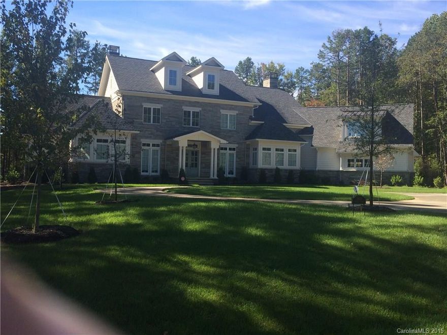 This magnificent luxury home contains 5 BR's - 5 Full Baths + 2 Half Baths . The home has an extraordinary design with an open floor plan which conveys a truly spacious living environment. Fabulous gourmet kitchen with furniture quality custom cabinets and featuring the latest appliances by Subzero & Wolf. 2- 10' pocketing glass doors opening to a covered outdoor living area, wood burning fireplace & entertainment center complete w/motorized screens for year round comfort.