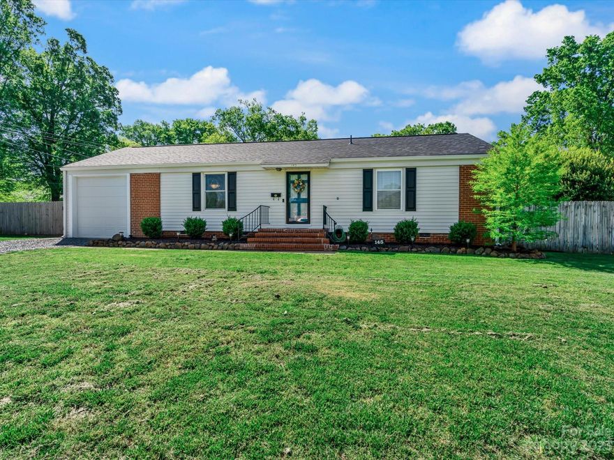 Adorable 1956 brick and vinyl ranch bungalow with 1 car garage on quite corner lot. 2 bedroom with 1 and a half bath totally updated with open floor plan.  Home is immaculate with original hardwood floors that have been restored to their original beauty, beautifully tiled bathroom with half bath in primary bedroom with his and her closets.  Kitchen recently updated with large single sink and beautiful new granite counters.  Stainless Steel appliances, newer dishwasher and range.  Home has new roof and new complete HVAC 2022.  Laundry room is off garage thru kitchen.  The backyard is fenced in and has a large entertainers deck. Backyard is private and there's even room for a pool.  This home blends the character of the past with the updates of modern conveniences. A must see.