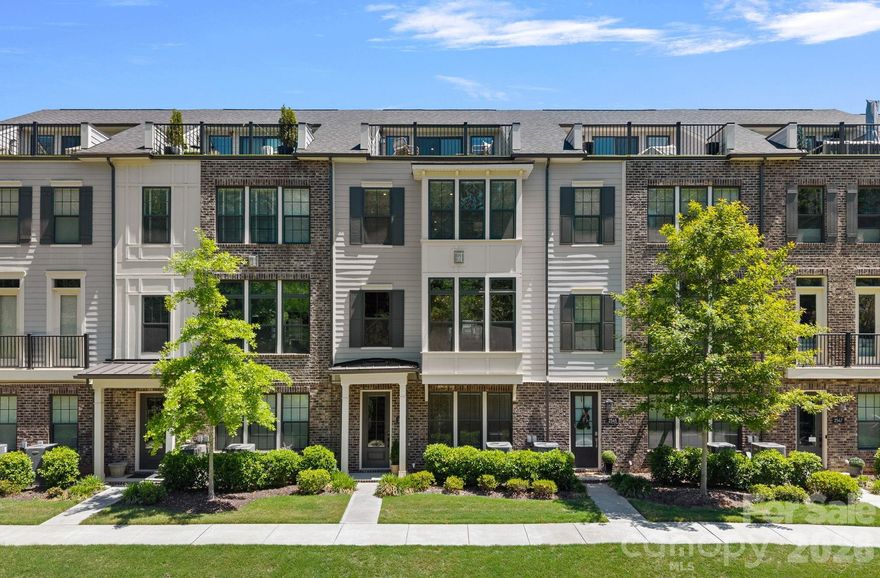 Exquisite luxury townhome in the desirable Elizabeth Glen community, ideally positioned in the heart of the Elizabeth neighborhood. Spanning four impeccably designed levels, this sophisticated residence showcases a refined balance of elegance, comfort, and modern functionality. The entry level sets the tone with a private guest suite featuring an ensuite bath—perfect for visitors or a secluded home office—alongside a thoughtfully designed drop zone that brings both style and organization to daily living. The main living level is nothing short of stunning. A chef-inspired, light-filled kitchen anchors the space, seamlessly connecting to an elegant dining area and an expansive living room. A sleek gas fireplace and walls of oversized windows bathe the home in natural light, creating an atmosphere that is both inviting and elevated. Just beyond, a covered balcony is ideal for effortless entertaining or quiet evenings. The third level is dedicated to a serene primary suite, a true sanctuary featuring a spa-like bath designed for relaxation. An additional ensuite bedroom on this floor, complete with a custom Murphy bed, offers both flexibility and refined functionality for guests or multi-purpose use. Crowning the home, the top level delivers exceptional versatility with a fourth bedroom and full bath—perfectly suited for a private office, media retreat, or exercise space—and opens to a stunning rooftop terrace. Here, tranquil, tree-lined views provide a peaceful and picturesque setting for outdoor living. Meticulously maintained and curated with an eye for detail, this remarkable residence offers an elevated lifestyle defined by luxury, sophistication, and effortless living in one of the city’s most charming and convenient locations.