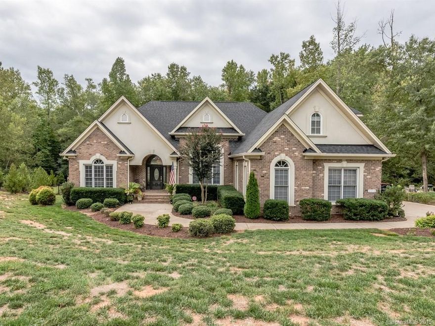 Gorgeous Custom RANCH with upper Bonus Suite with bath & a Beautiful Backyard Oasis! Complete with tiered Deck, extensive paver Patio, In-ground Pool with sitting ledge, Stone Hot Tub, Fire Pit & Fenced Yard. Chef's Kitchen and open flow to Great Room with fireplace & builtins. Luxurious Master Suite with sitting area and elegant bath. Full Acre lot on a quiet cul-de-sac that backs to neighborhood park!