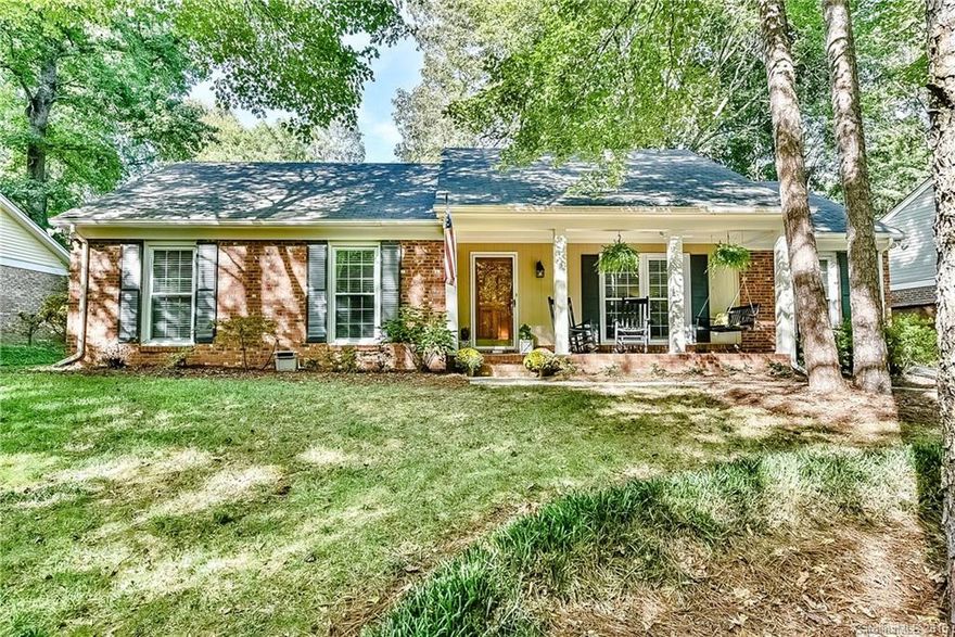 Bring your most particular buyers to this charming ranch. Completely updated and fabulous! Open floor plan with vaulted ceilings. This homes has it ALL~New Light fixtures~New wood floors throughout~New Hardware~Fresh Paint. Kitchen has granite and Updated Cabinets/Appliances. HVAC replaced in 2011. Updated Baths. Screen porch overlooks fully fenced yard. Enjoy the rocking chair front porch!