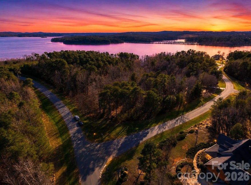 Build your dream home in the highly sought-after Heron Bay community on beautiful Lake Badin. This wooded homesite offers the perfect blend of privacy, natural beauty, and resort-style amenities in one of the area’s premier gated lakefront neighborhoods.

Residents enjoy access to a community clubhouse, pickleball court, boat launch, day docks, and beautifully maintained common areas. Spend your days boating, fishing, kayaking, or simply enjoying the peaceful surroundings and scenic views that make Lake Badin such a desirable destination.

Heron Bay is known for its tranquil setting, mature trees, and upscale custom homes, while still providing convenient access to local dining, golf, recreation, and nearby Albemarle and New London amenities. Whether you’re looking for a primary residence, second home, or investment opportunity, this property offers an exceptional chance to enjoy the lake lifestyle without the expense of direct waterfront ownership.

Come experience all that Heron Bay and Lake Badin have to offer and start planning your future in this beautiful lakeside community.
